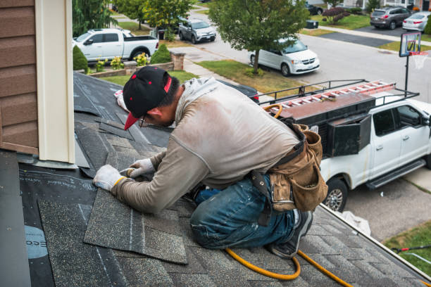Professional Roofing technician working in Kingston, NY